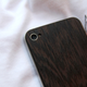 Illustration for article titled Wooden iPhone 4 Backs: Tackily Awesome, or Awesomely Tacky?